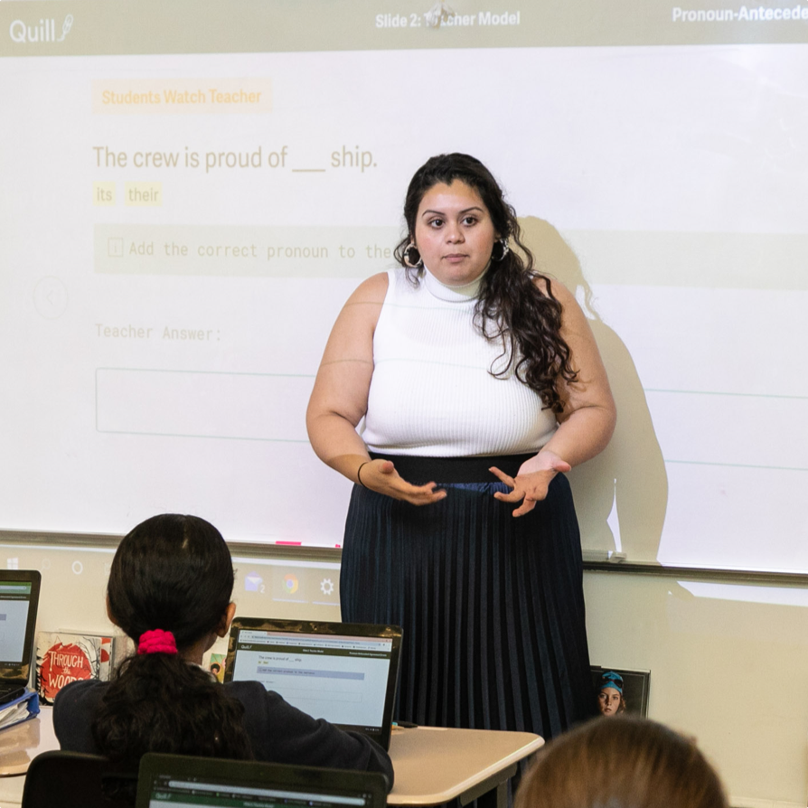 Teacher presenting a whole-class lesson to their students.